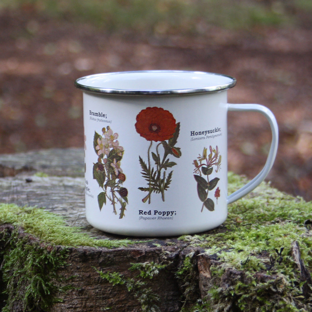 We are in love with our ecology enamelware mugs - This one is a perfect celebration of wildflowers! Whether to brighten up the kitchen, to make your guests smile, or as a gift, these mugs are a perfect eco-friendly alternative to disposable cups. Embrace nature with this enamel mug with all over wildflower print. Enjoy at home or out and about with these versatile mugs, available in a range of styles!