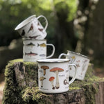 Load image into Gallery viewer, A collection of our enamel mugs with various wildlife-inspired patterns
