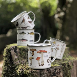 A collection of our enamel mugs with various wildlife-inspired patterns