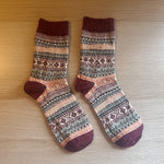 Load image into Gallery viewer, Treat yourself or a loved one to something cosy this season, with our socks and candle gift set! Including a pair of wine-coloured socks (Size 4-8) and one of our freshly picked pumpkin candles, this is the perfect treat to stay in with!
