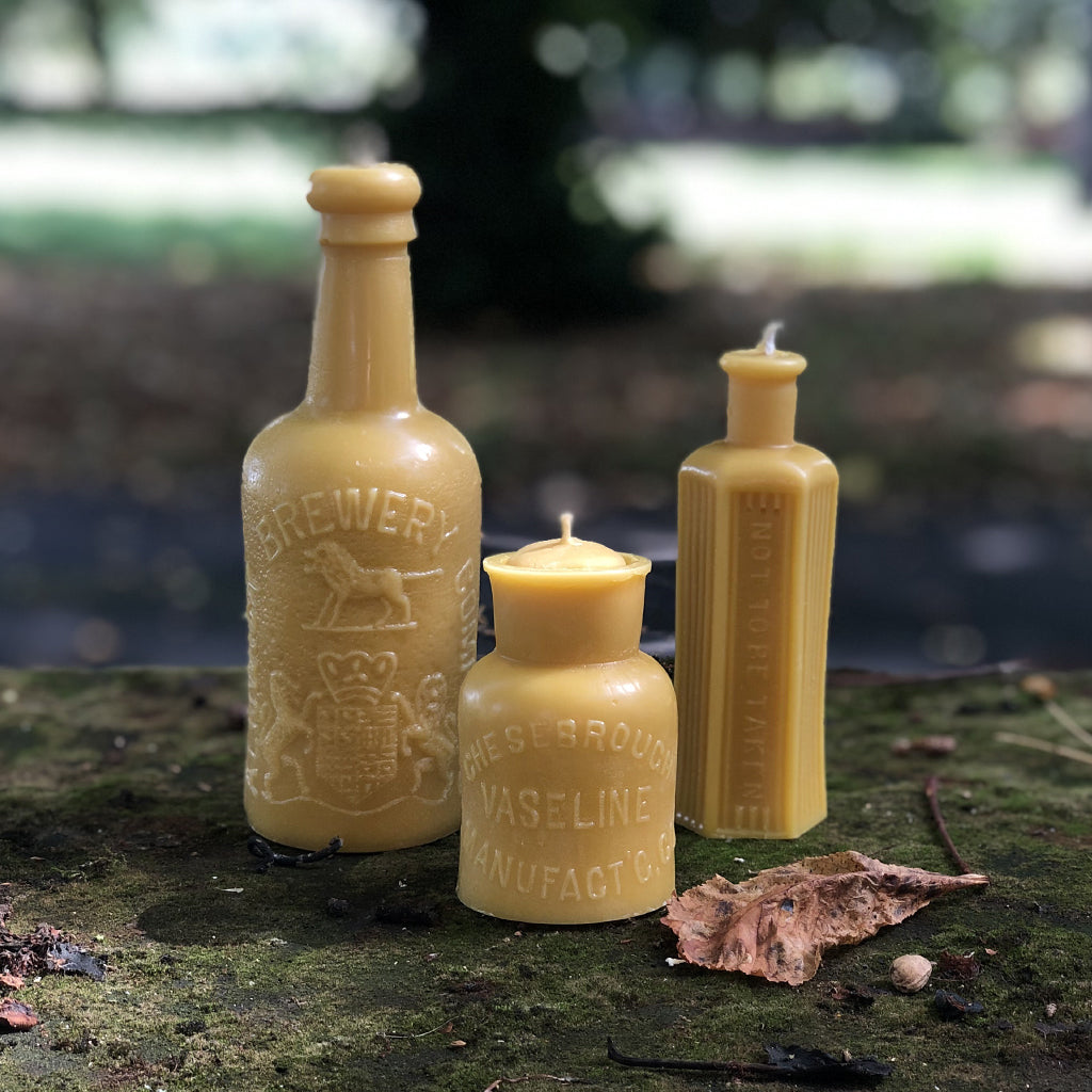 This quirky poison bottle - shaped beeswax candle is created from an actual vintage poison bottle! (which we ourselves are big collectors of...) Distinctive to the touch so that you wouldn't reach for the wrong bottle on those long, dark winter nights, this quirky candle would make the perfect unique bit of home decor and burns for approximately 20 hours!