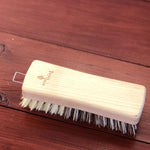 Load image into Gallery viewer, This quirky vegetable brush will make light work of scrubbing those Sunday dinner veggies! Used to gently clean vegetables without the need to peel means you can enjoy more of the nutrients! Comprised of a rough and gentle side for all types of vegetables, this handy kitchen brush can also be used as a household scrubbing brush if you&#39;d prefer! Made with natural vegan bristles and complete with a handy mental loop attachment for easy hanging. 
