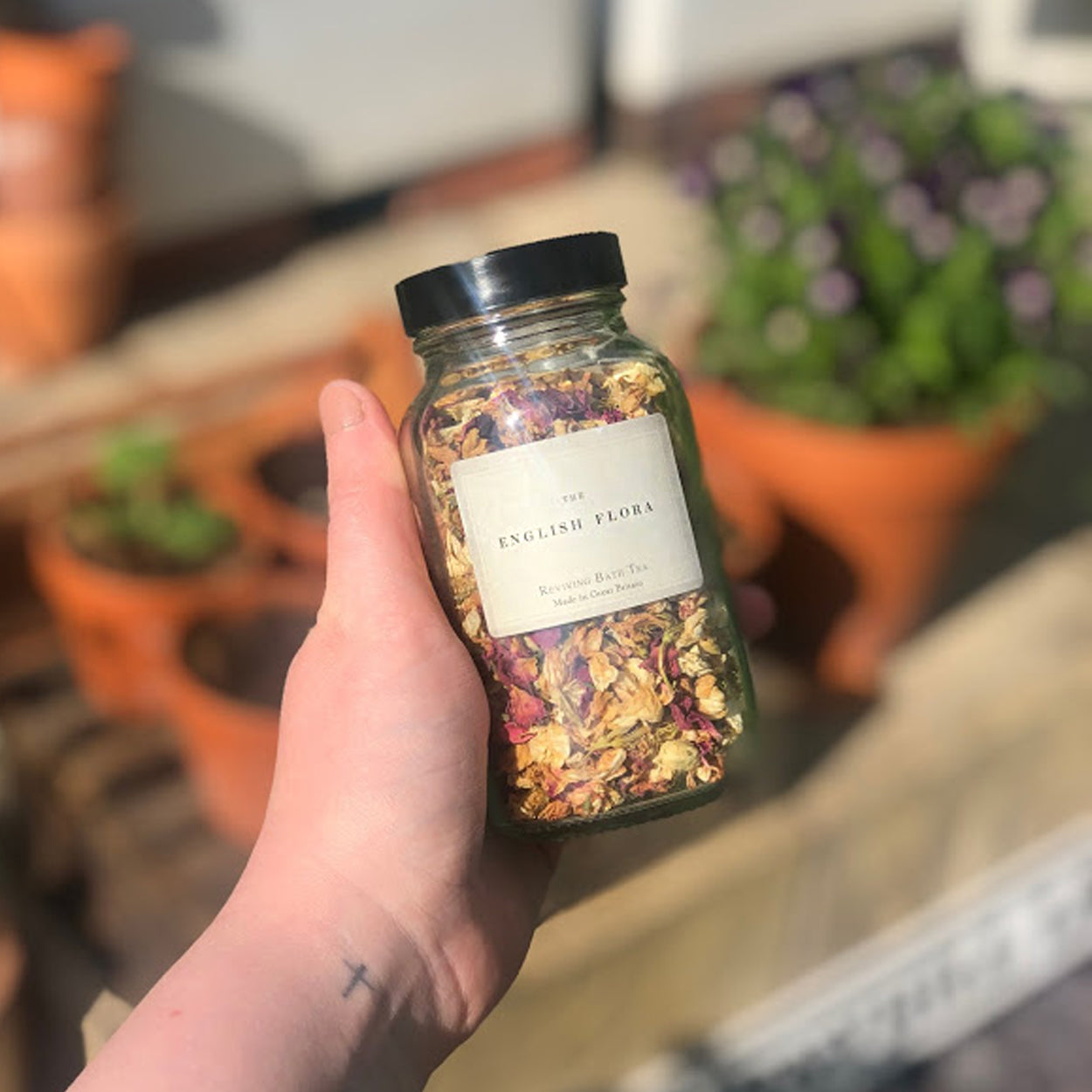 Natural flowers and herbs fill this jar of Reviving Bath Tea. Supplied with paper bags in a recyclable Kraft box, this gorgeous gift is a perfect pre-made care package for somebody you love, or a special treat to look forward to after a hard day.