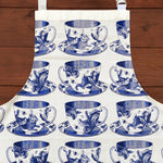Load image into Gallery viewer, Craft the perfect Afternoon Tea with our exquisite hand printed 100% cotton Teacup apron! In gorgeous blues, this high quality apron will have you looking like a kitchen superstar while protecting you from any potential icing sugar disasters! This Thornback &amp; Peel apron would make a wonderful gift for yourself or a loved one.
